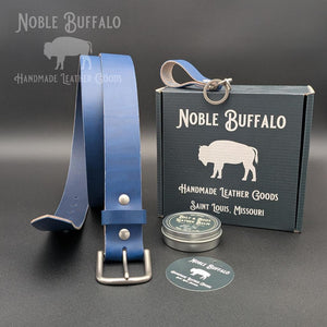Bluebonnet full grain leather belt handmade in the USA by Noble Buffalo. Bright blue leather belt in royal blue and cobalt blue tones. Unisex colorful statement leather belt.