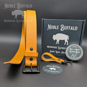 Goldenrod full grain leather belt handmade in the USA by Noble Buffalo. Bright yellow leather belt in shades of goldenrod, sunflower yellow, and vibrant classic yellow. Unisex colorful statement belt.