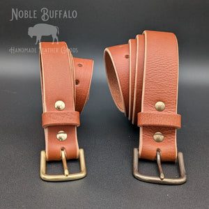 Noble Buffalo handmade brown steerhide leather belt with burnished edges and solid brass hardware

