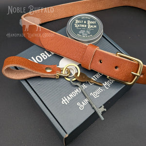 Handmade brown latigo leather belt with antique brass buckle and soft textured finish, crafted in St. Louis, Missouri
