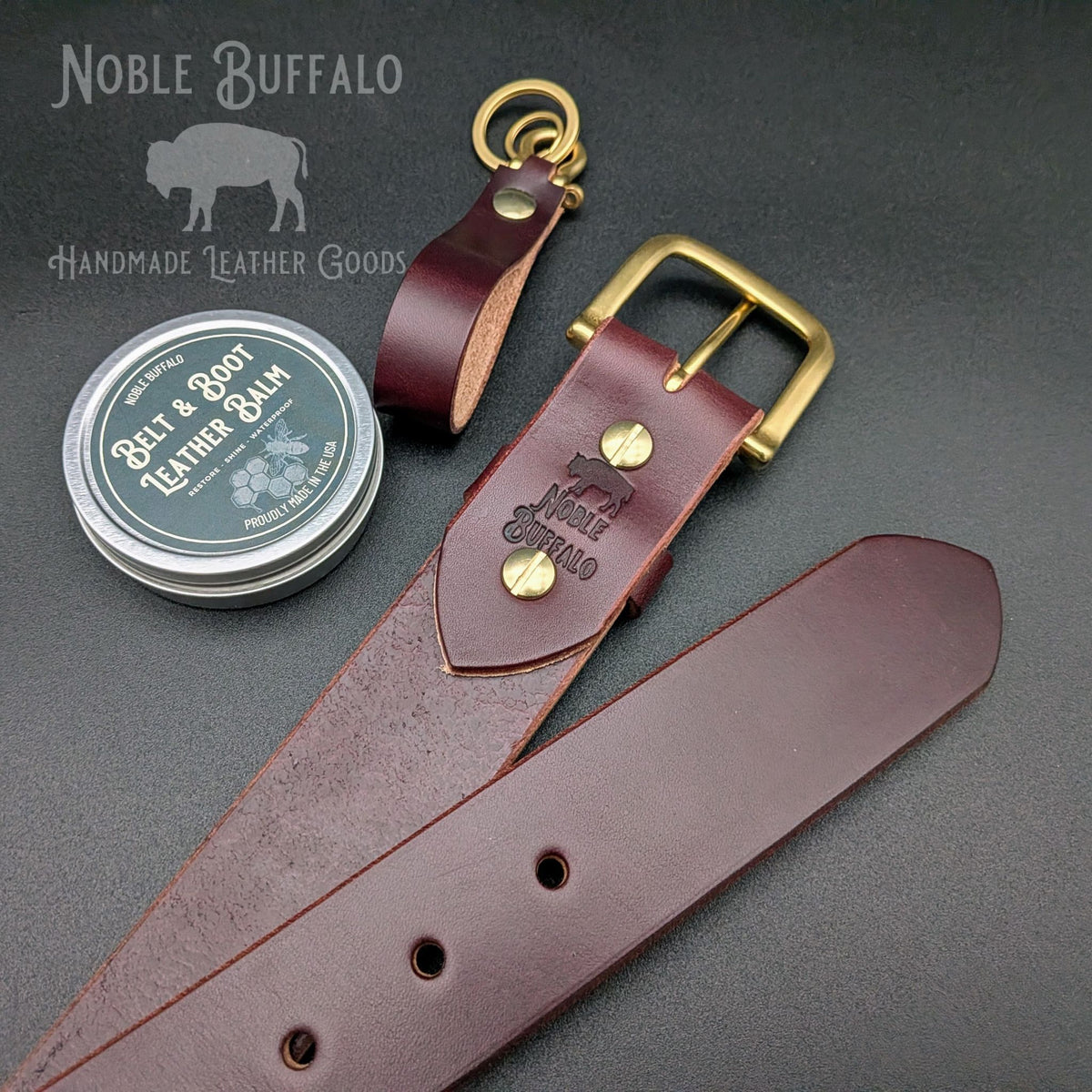 Sunset Harness full grain leather belt in dark brown English bridle with burgundy tone, brass hardware and burnished edges, handmade in USA